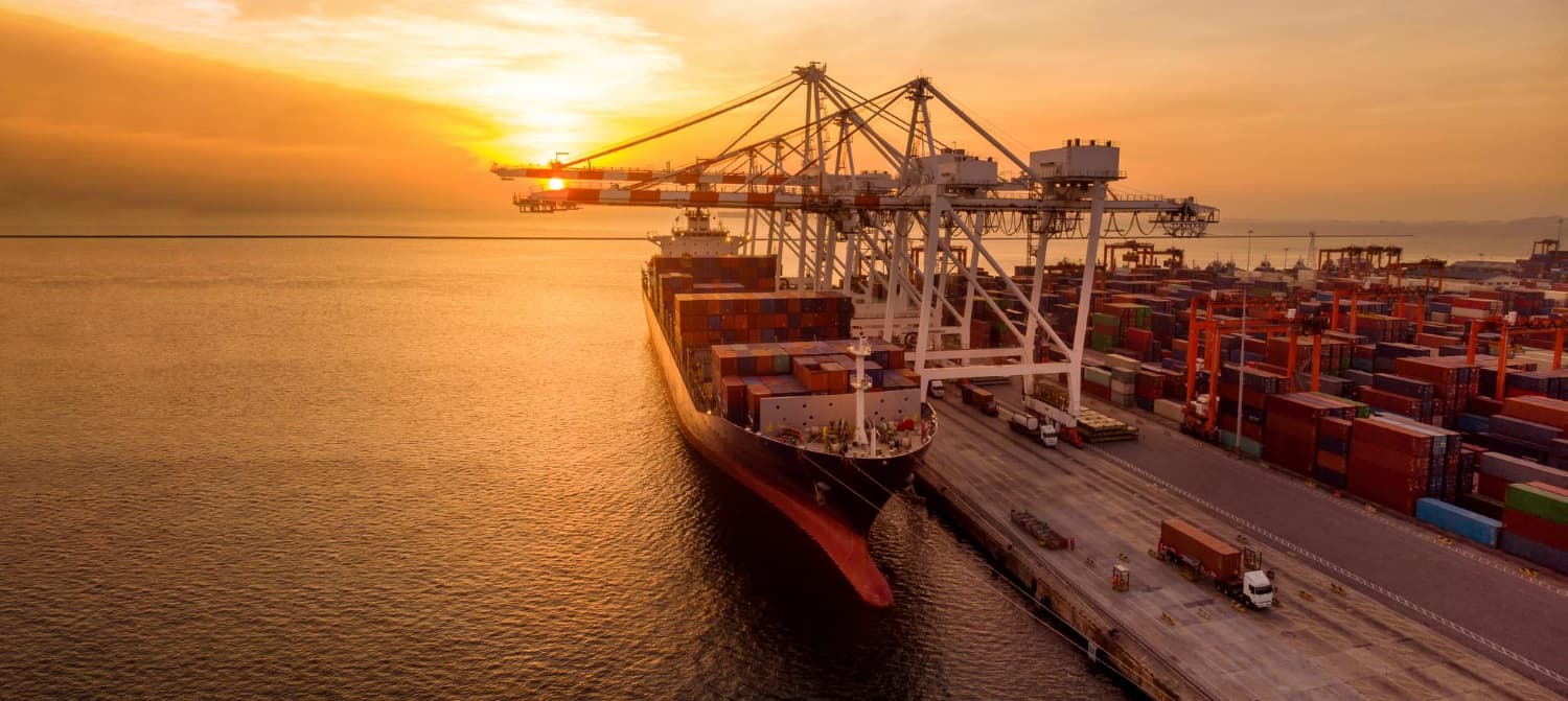 IWCC cargo operations at a port and on the road at sunset
